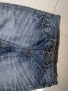 Calvin Klein Women's Blue Distressed Jeans