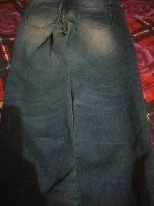 Ripped Knee Jeans