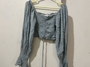 light blue off the shoulder long sleeve crop top