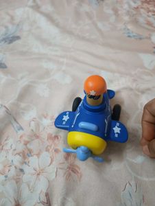 Blue Toy Airplane with Pilot