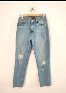 Ripped Light Wash Denim Jeans