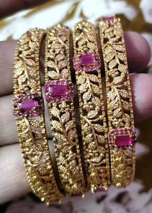 OG AD stone Elegant Gold Bangles with Ruby Accents