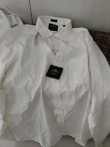 white branded shirt old but unused