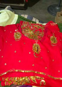 Stunning Red Embroidered  Saree with stitched bila
