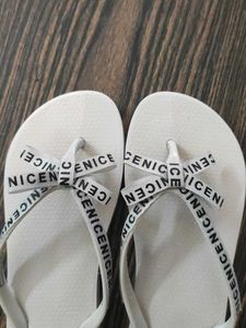 Women's White Flip Flops with Bow Detail