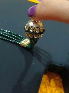 Green Beaded Bracelet with Charm
