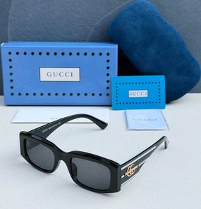 Gucci Sunglasses Black with Gold Detail
