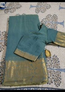 Elegant Teal Saree with Gold Border