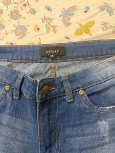 Distressed Denim Jeans