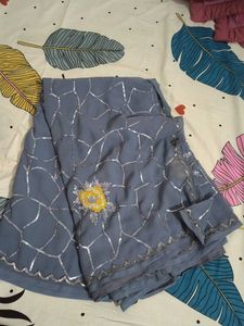 Elegant Grey Saree with Silver Details