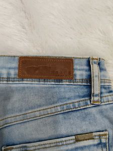 Distressed Light Wash Denim Shorts