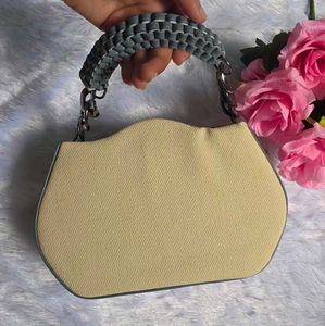 BRAND NEW Chic Beige Mini Handbag with Statement C