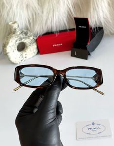 Prada Tortoiseshell Sunglasses