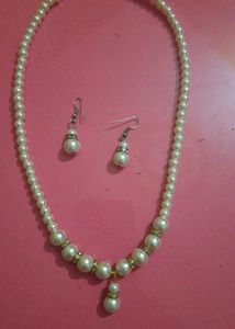 neck piece with earing