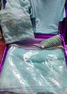 Sky Blue Embroidered Saree with stitched blouse
