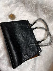 Embossed Black Handbag