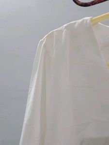 Elegant White V-Neck Blouse with Bell Sleeves