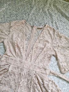 Elegant Lace Romper with Bell Sleeves