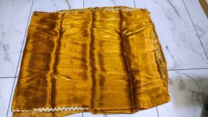 Orange Saree with Intricate Lace Border
