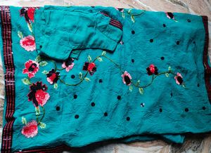 Elegant Teal Saree with Floral Embroidery