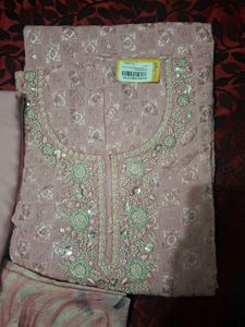 Elegant Pink Embroidered Kurta Set material