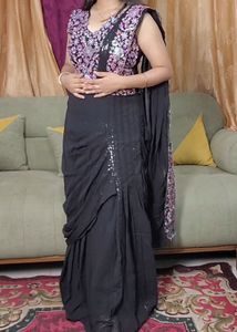 Elegant Black Saree with Floral Blouse
