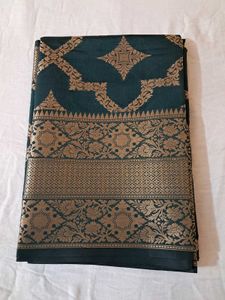 Elegant Teal & Gold Saree