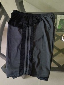 Tonal black side stripe shorts.