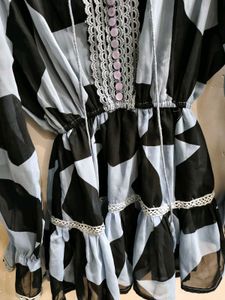 Sheer Geometric Print Ruffle top