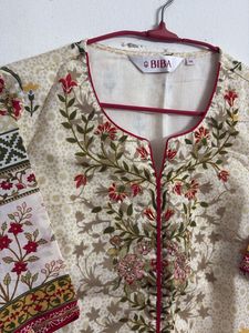 Elegant Printed Kurta with Floral Embroidery