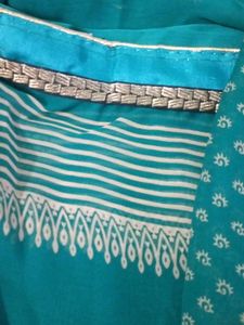 Elegant Teal saree with Intricate Print and unstit