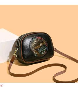 Chic Elephant Embossed Crossbody Bag