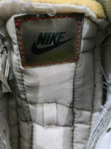 Nike Worn White High-Top Sneakers