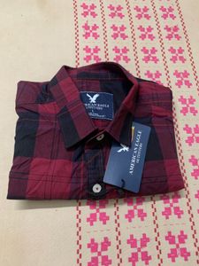 red check shirt with tag