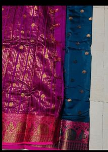 Stunning Teal Saree with Pink Border