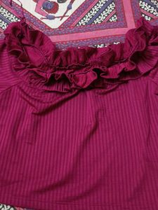 off shoulder style crop top with ruffle detail
