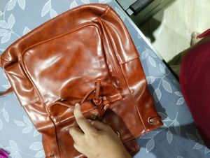 Brown leather backpack