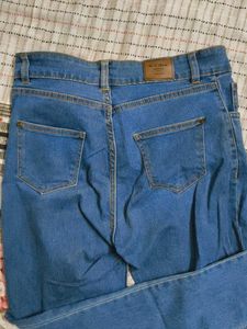 Blue Denim Jeans with Frayed Hem