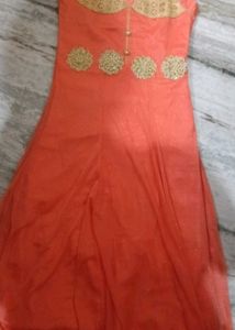 Elegant Coral Dress with Gold Embellishments