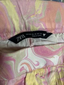 zara swirl marble satin flared trousers