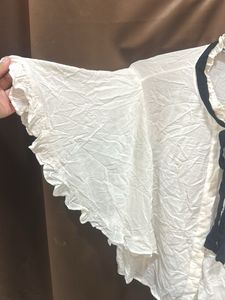 Elegant White Top with Black Ribbon