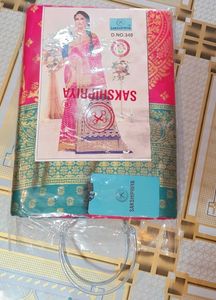 Beautiful Pink Silk Saree with Teal Border