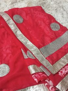 Elegant Red Saree with Embellishments