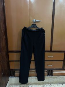 Classic black trousers from Zara Woman