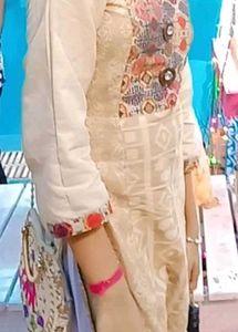 Elegant Cream Kurta with Colorful Neckline