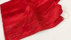 Elegant Black Saree with Red Floral Embroidery