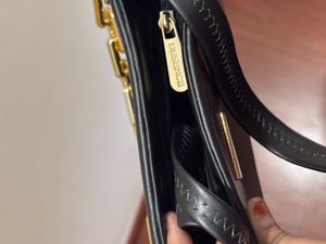 Chic Black Handbag with Gold Chain