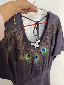 partywear dress with elegant peacock embroidery