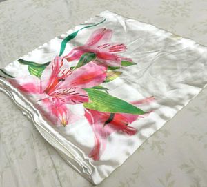 A SET OF 3 ROSEBY'S CUSHION COVERS