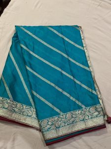 Stunning Teal Saree with Silver Border